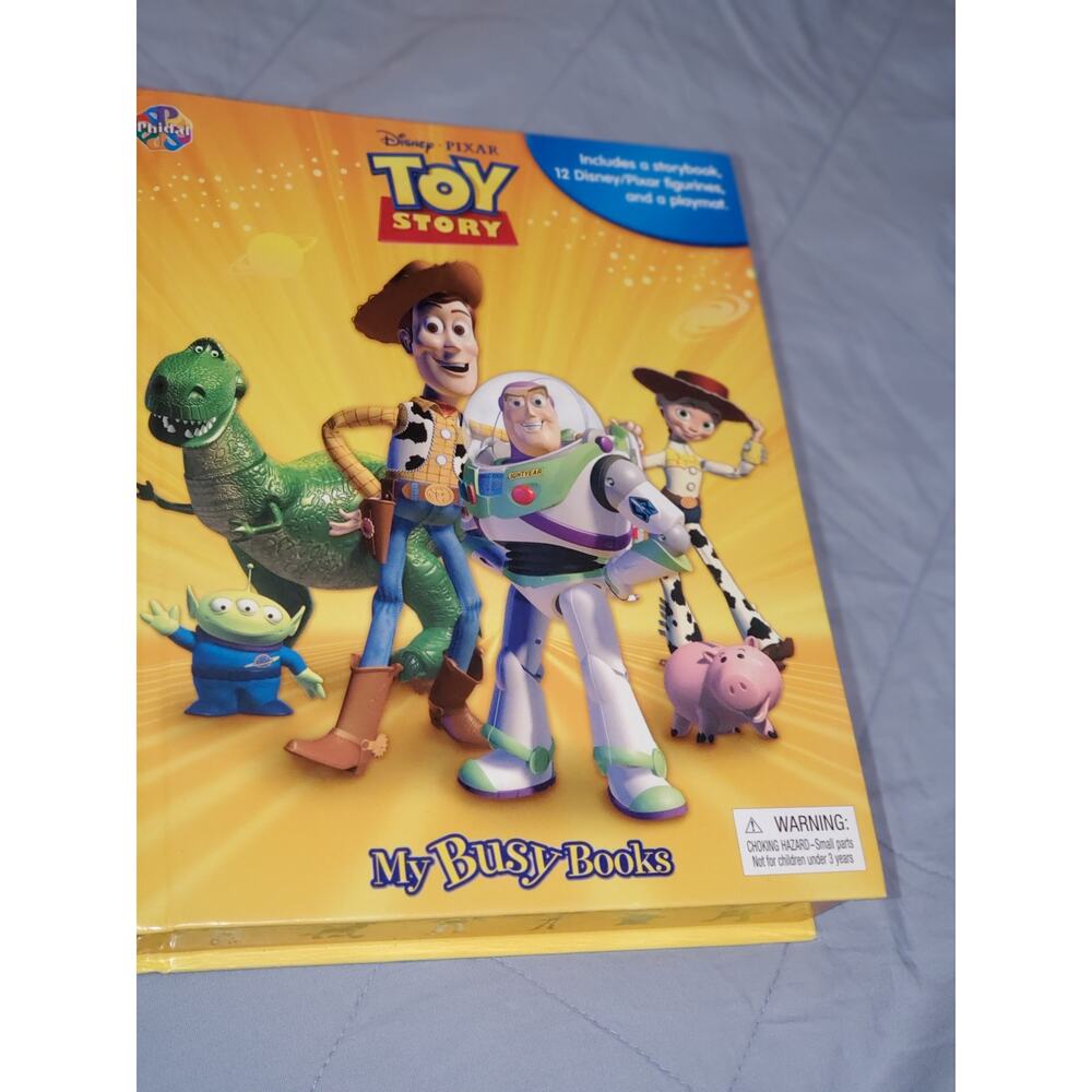 Toy Story book by Disney Pixar includes story book and 11 figurines